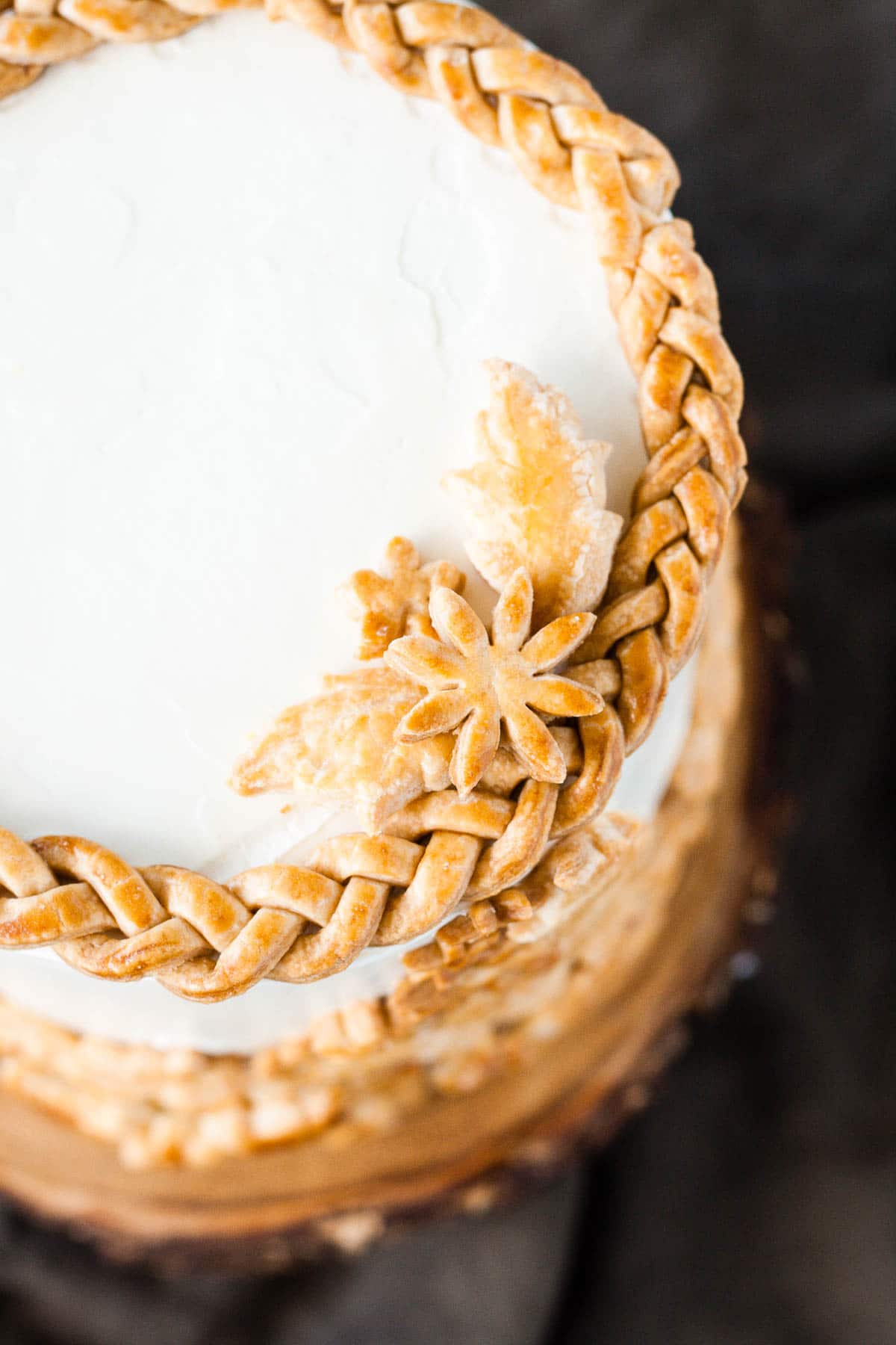 A close up of the pie pieces on top of the cake.