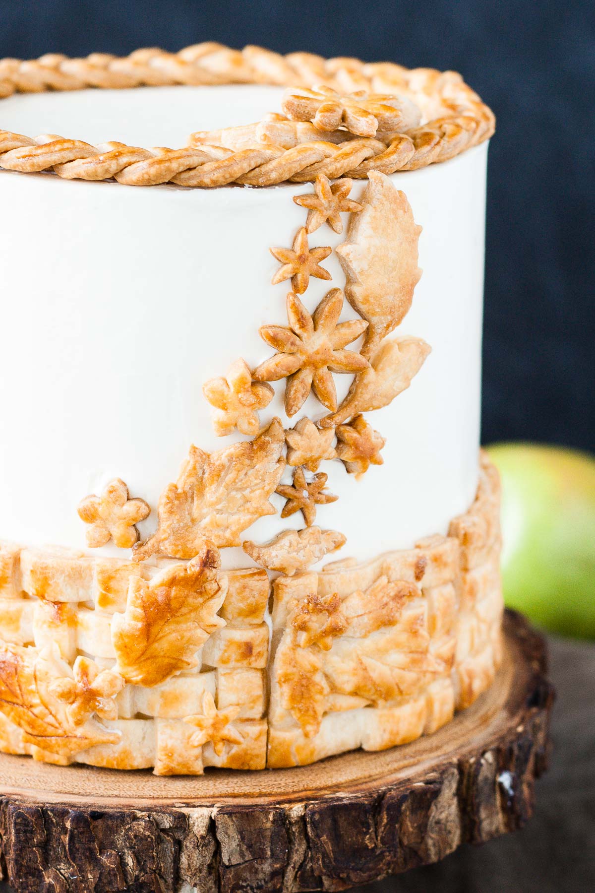 Close up of the pie pieces on the side of the cake.