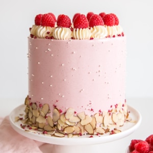 Cake on a white cake stand.