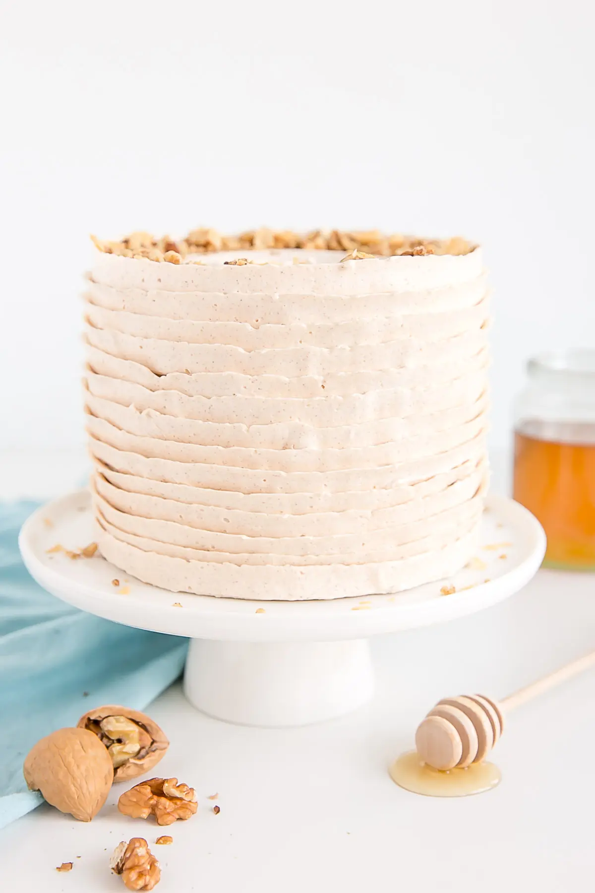 A baklava cake with layers of honey cinnamon frosting.