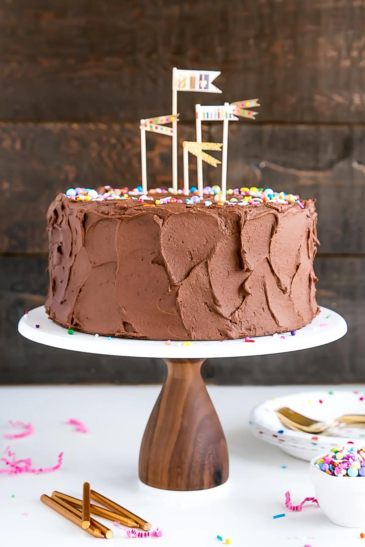 The ultimate birthday cake! A classic yellow cake with a rich chocolate frosting and colorful sprinkles.