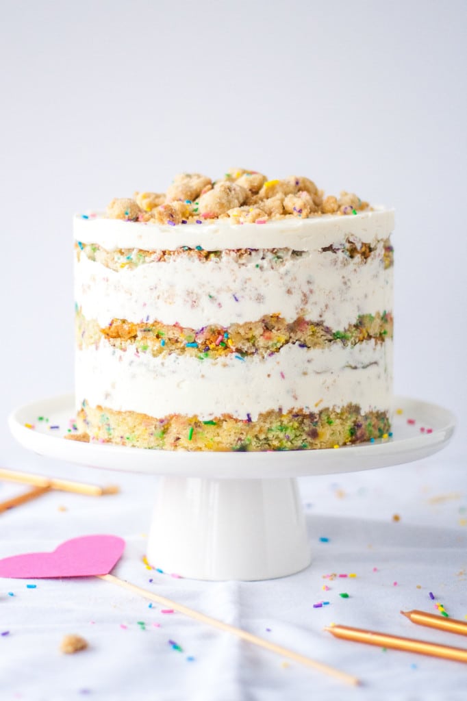 Cake on a white cake stand and white background.