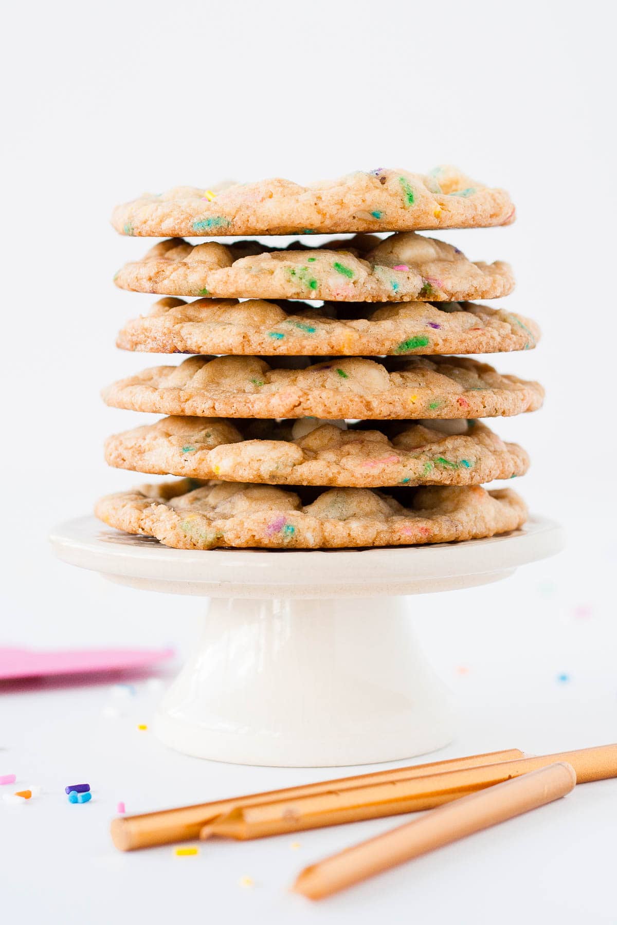 Stack of cookies on a small cupcake stand.