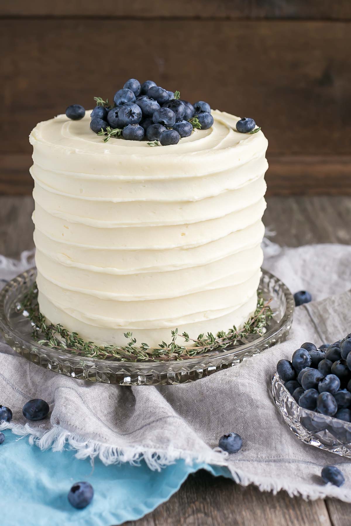 The delicious combination of bananas and blueberries gets paired with a tangy cream cheese frosting in this Blueberry Banana Cake recipe.