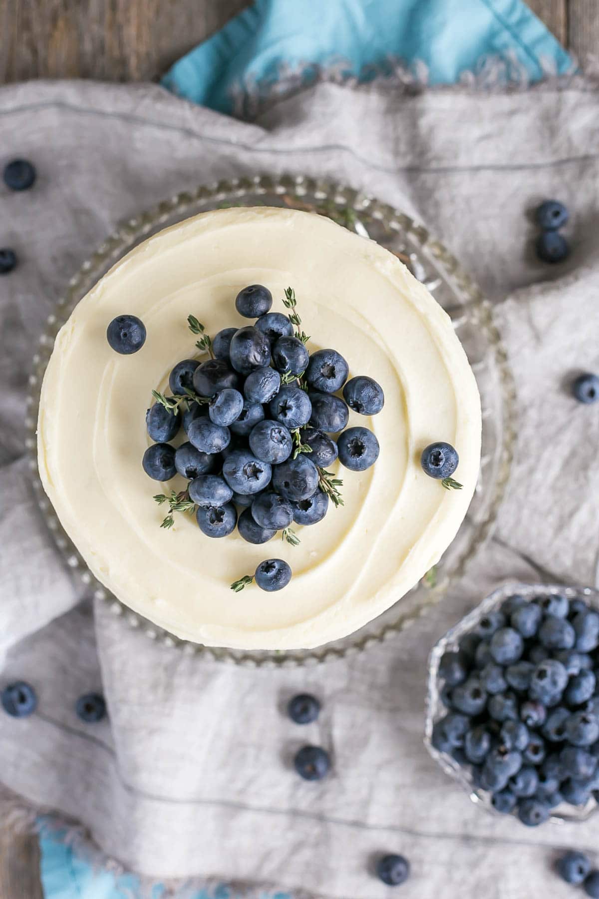 Overhear shot of this easy banana cake with fresh blueberries.