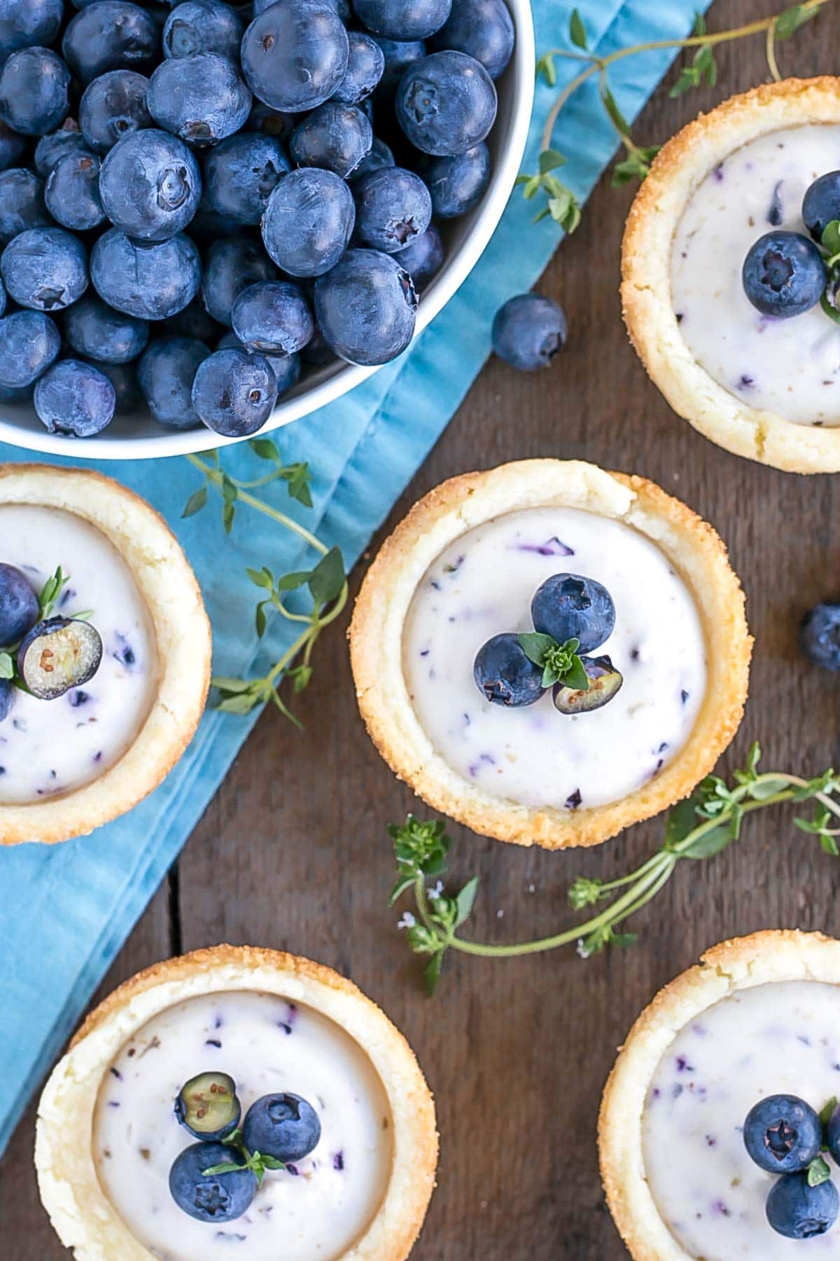 Overhead shot of cookie cups on a wooden board.