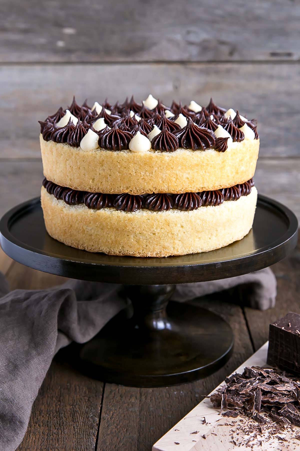 A decorated cake on a cake stand