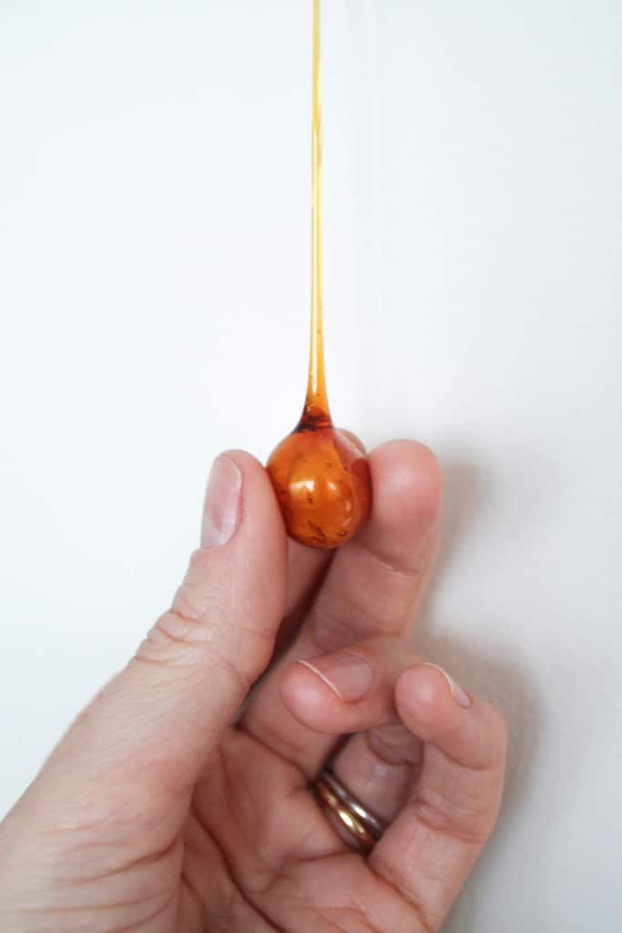 Holding a candied hazelnut.