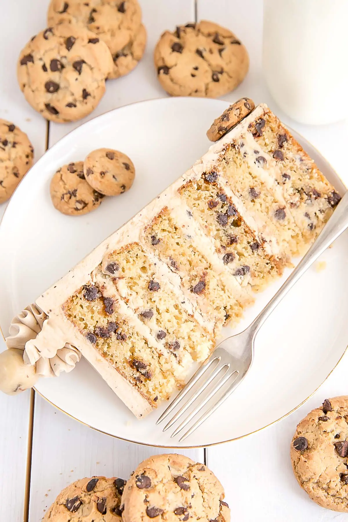 Slice of Chocolate Chip Cookie Cake with 6 layers.