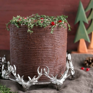 A decorated cake on a cake stand