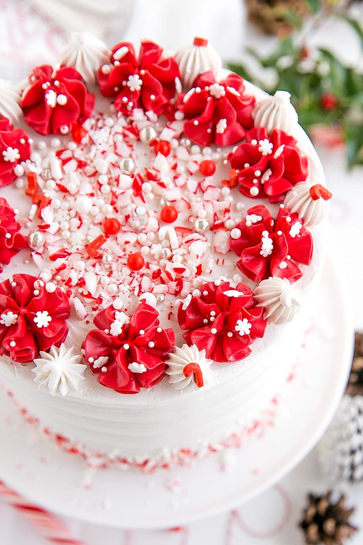 Overhead shot of the cake showing the red dollops and sprinkles.