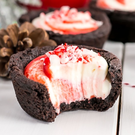 Close up of a cookie cup with a bite taken out.