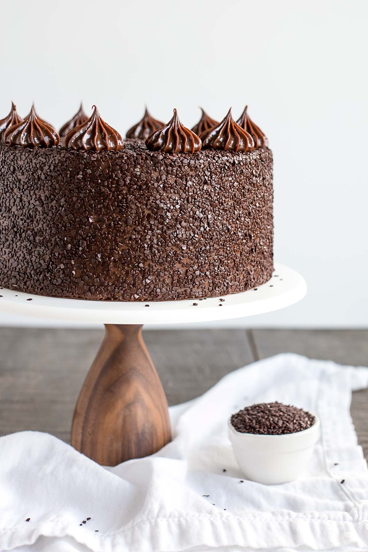 A large chocolate cake sitting on top of a table