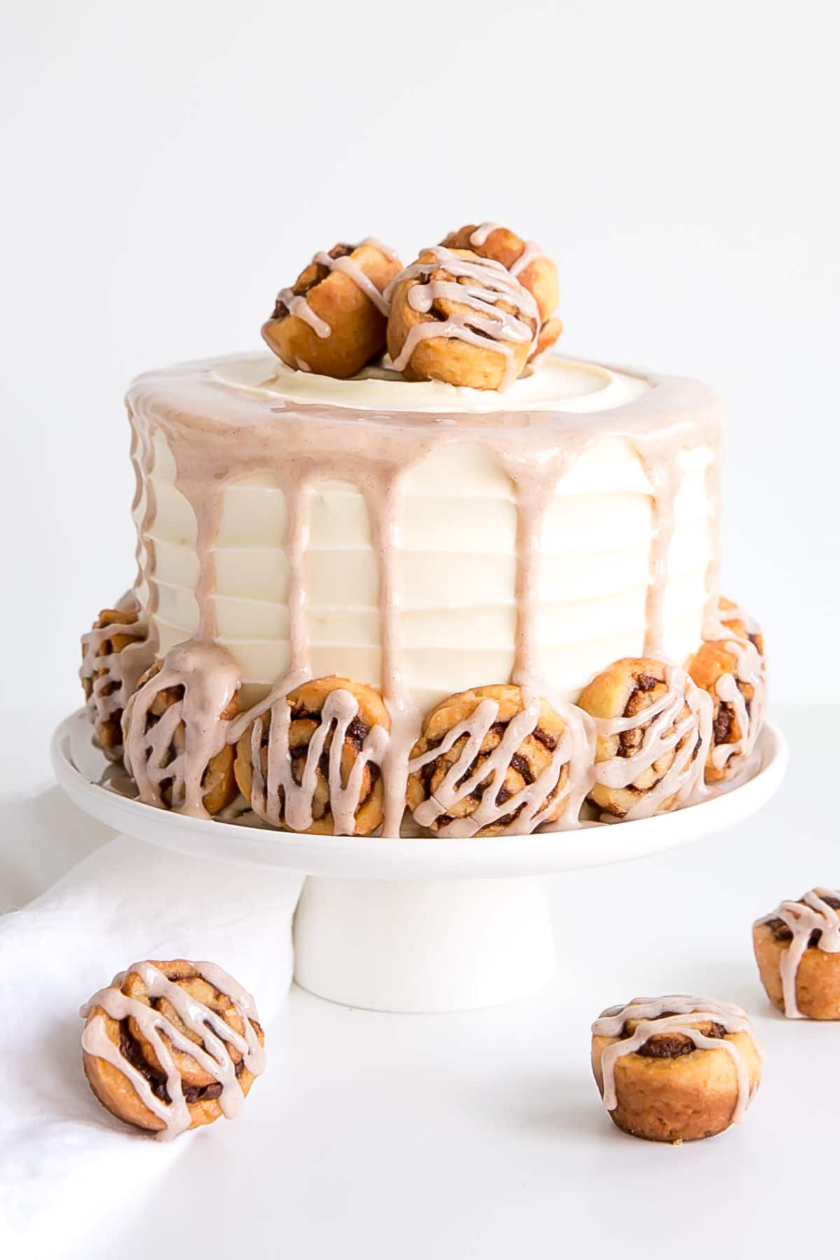 Cinnamon Roll Cake with mini cinnamon rolls and a cinnamon glaze.