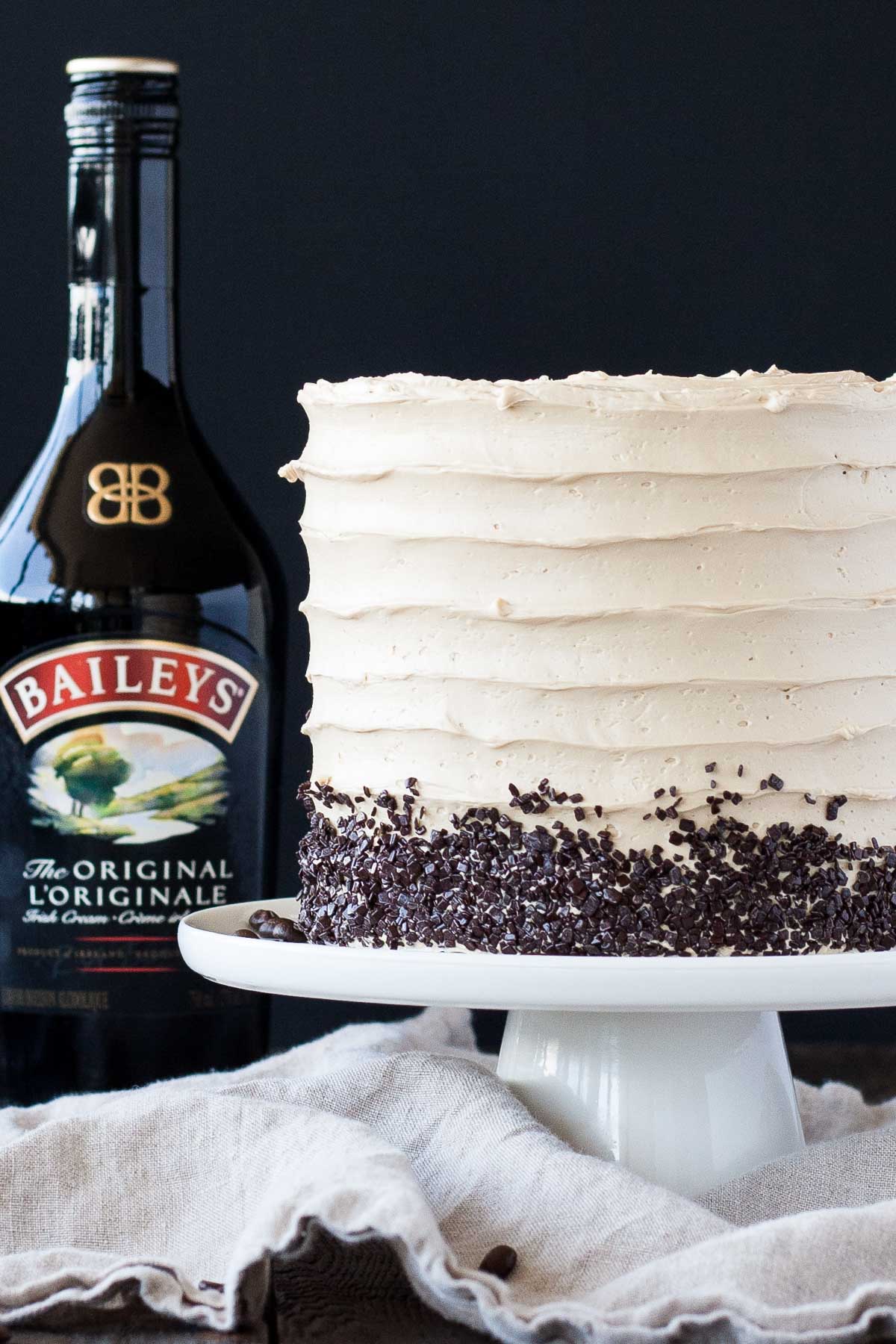 Cake on a white cake stand.