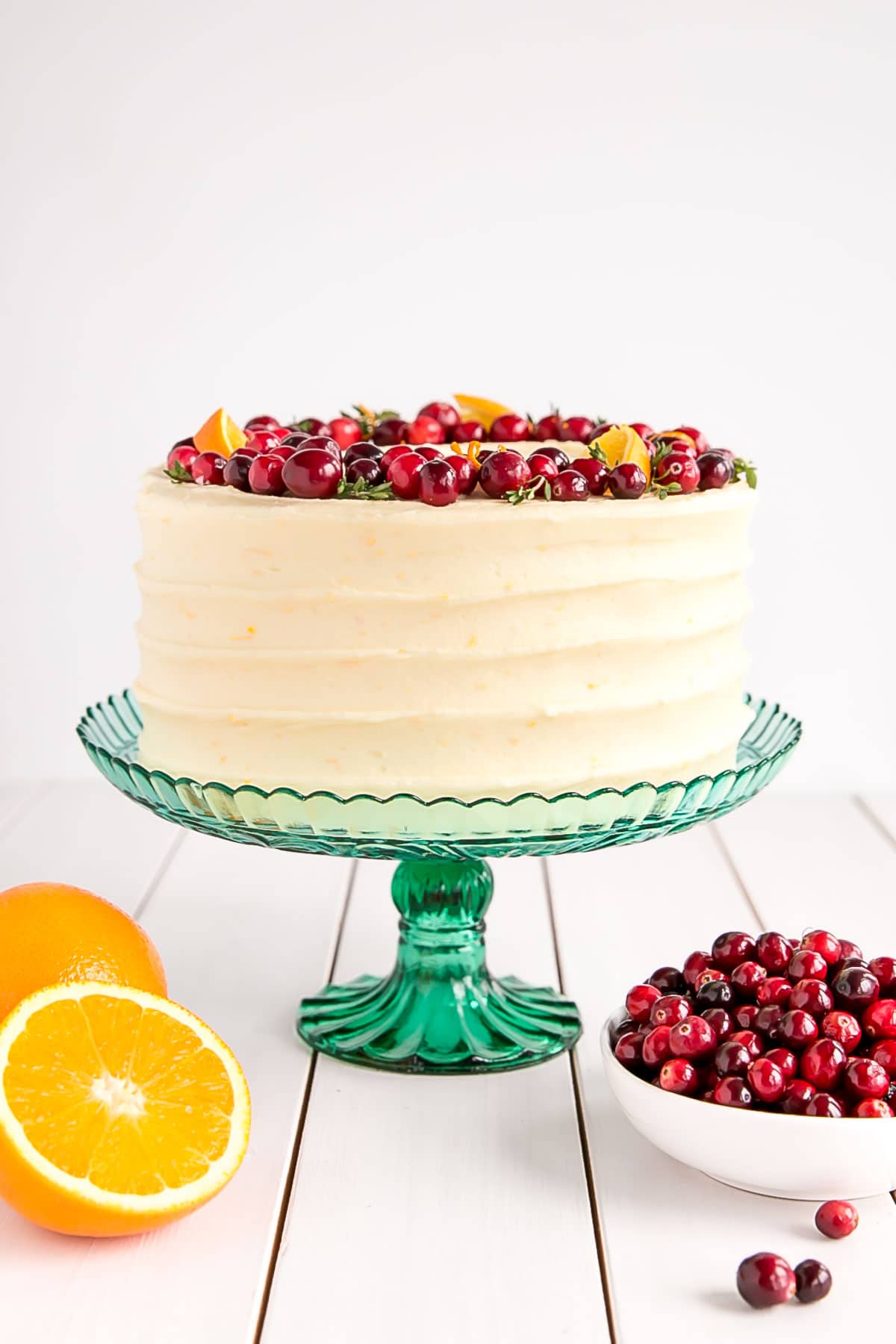 A cake with fruit on top of a table