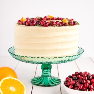 A cake with fruit on top of a table