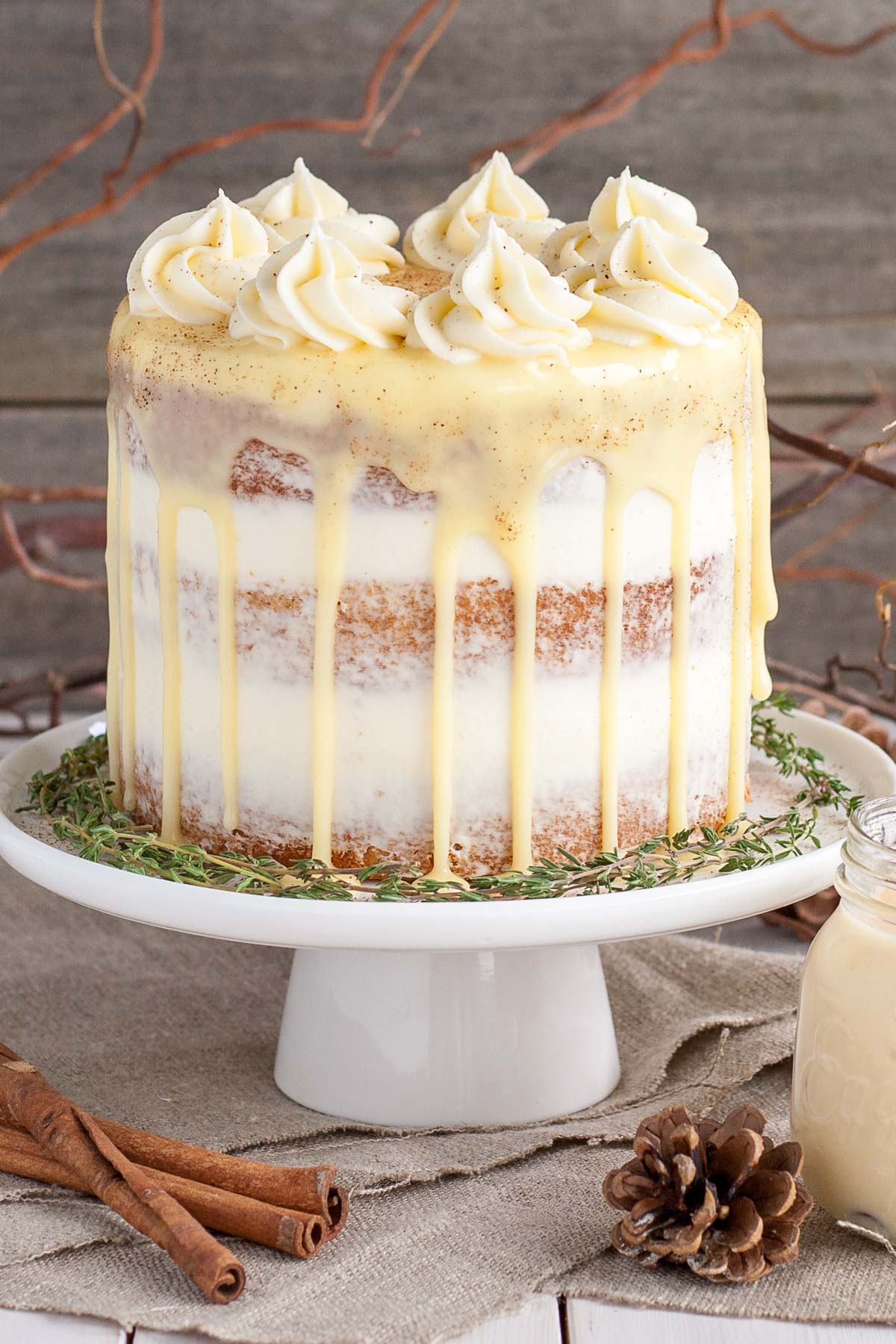 Eggnog cake with cream cheese frosting and white chocolate ganache.