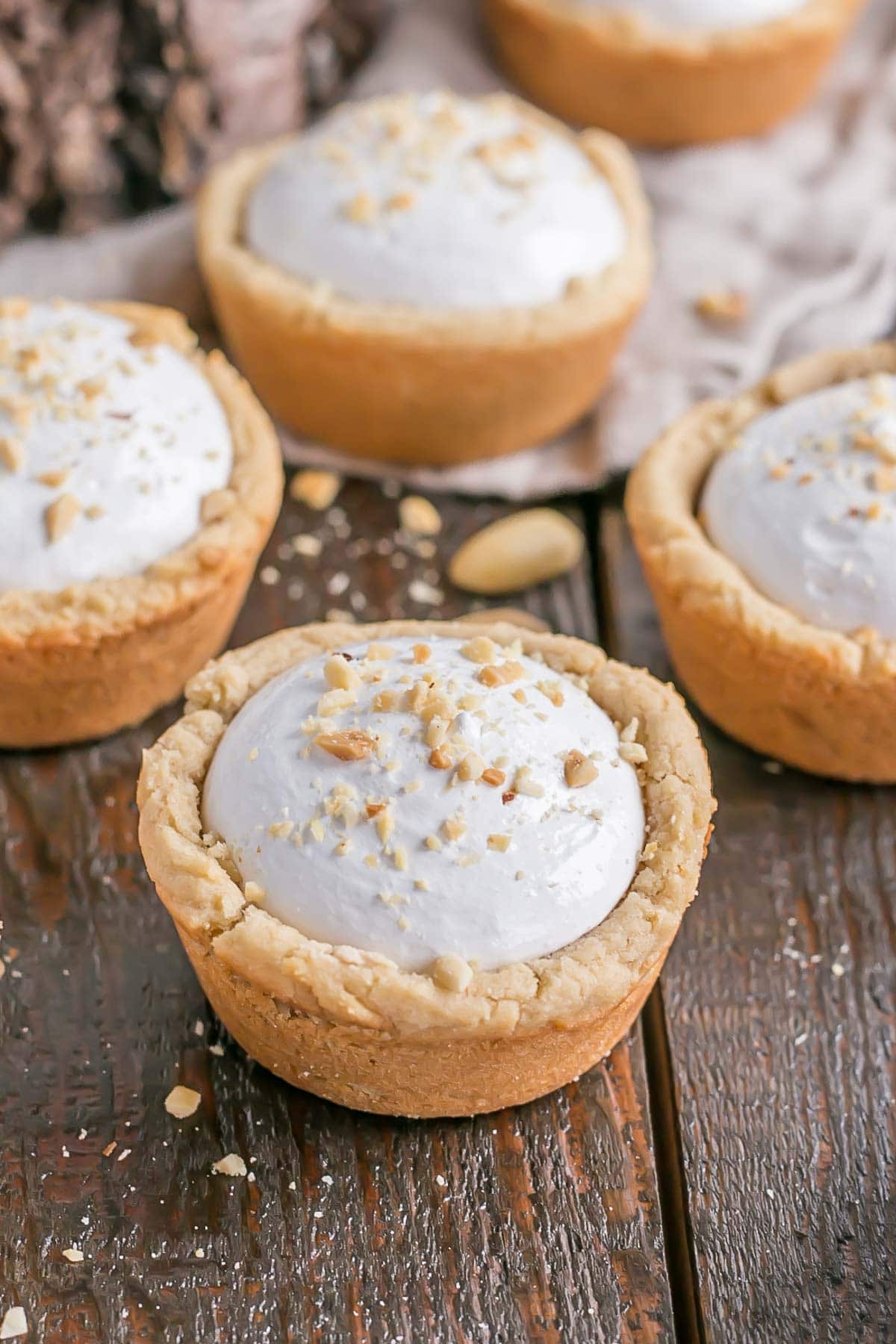 Fluffernutter cookie cups -- peanut butter cookie cups with peanut butter frosting and marshmallow fluff.