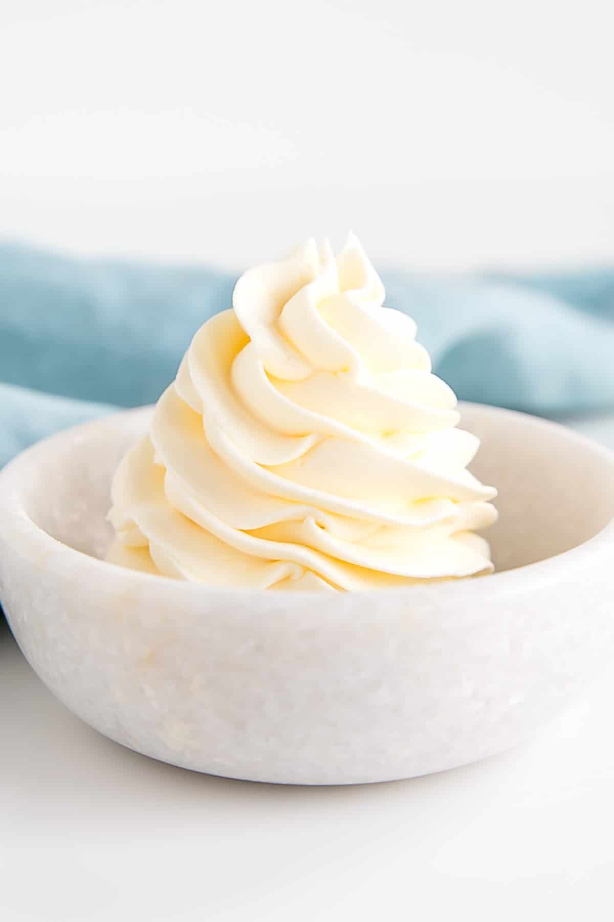 Rosette of German buttercream in a small bowl.