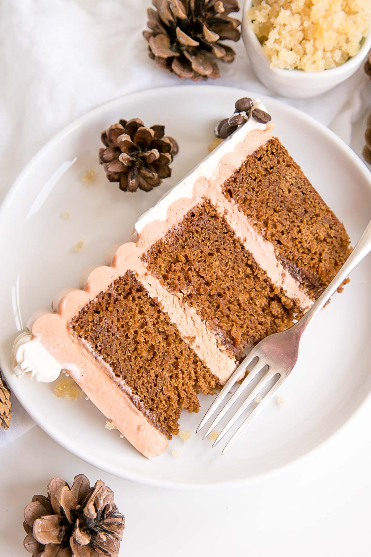 Slice of gingerbread latte cake on a plate.