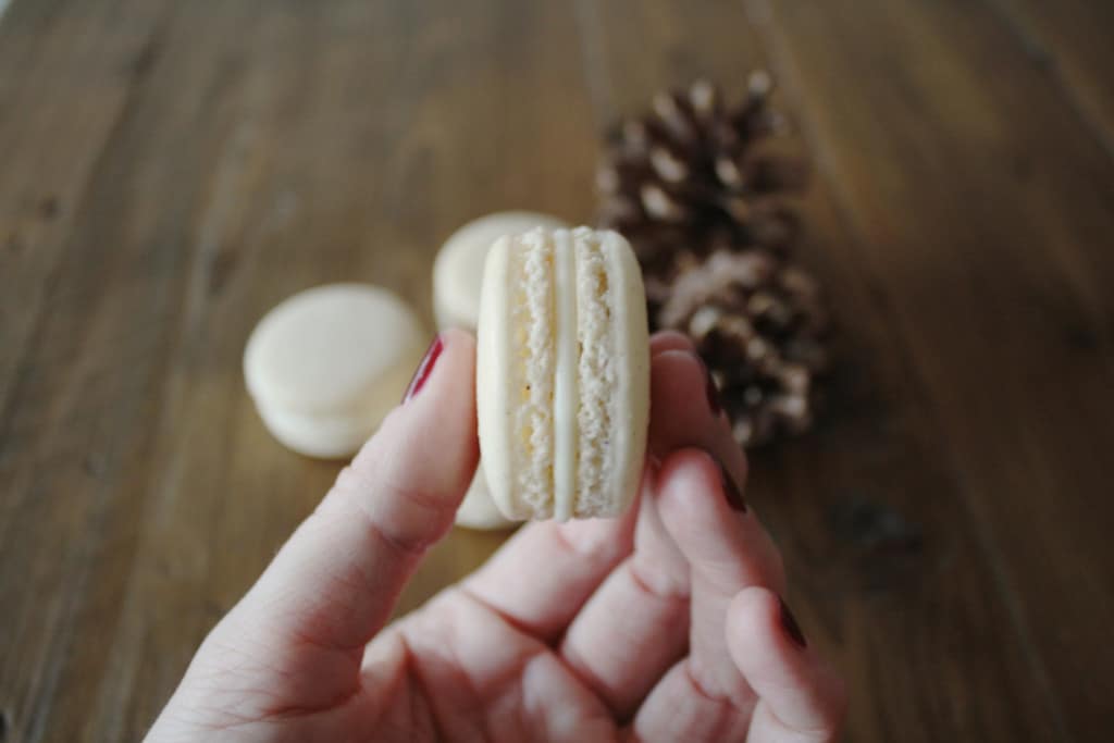 Close up holding a macaron.