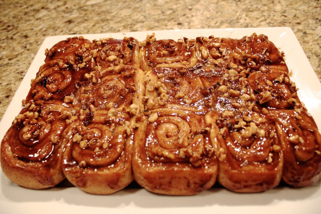 Cinnamon rolls flipped out onto serving dish