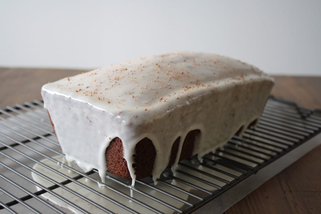 Glazed loaf on a cooling rack.