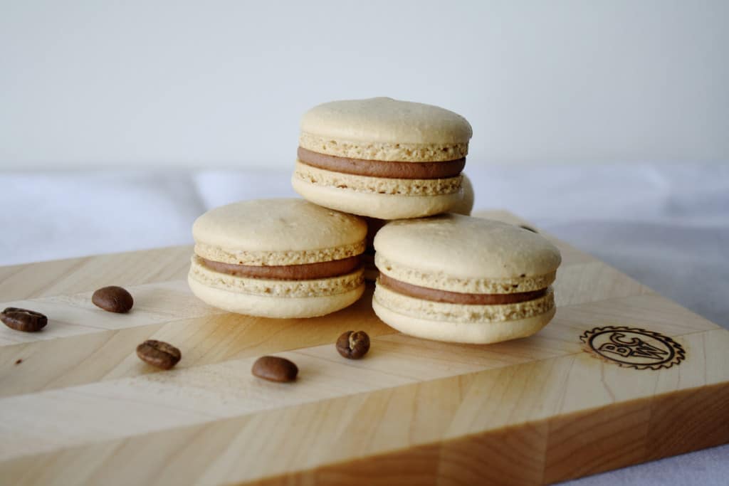 Macarons on a cutting board.