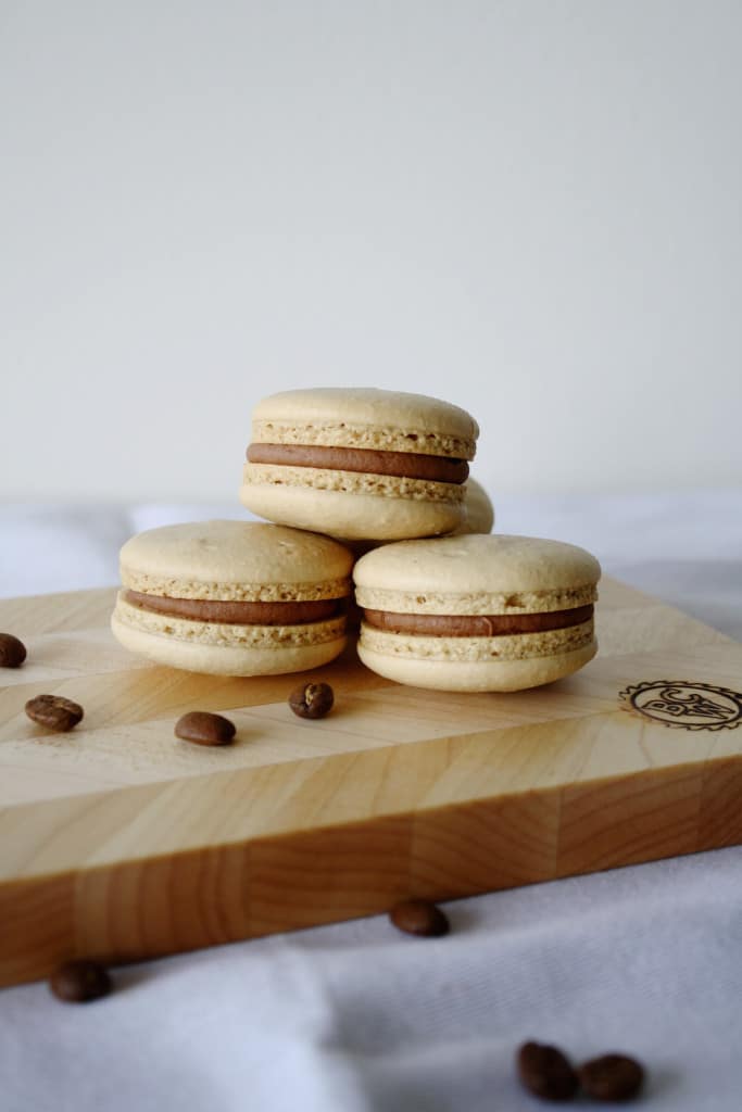 Macarons on a cutting board.