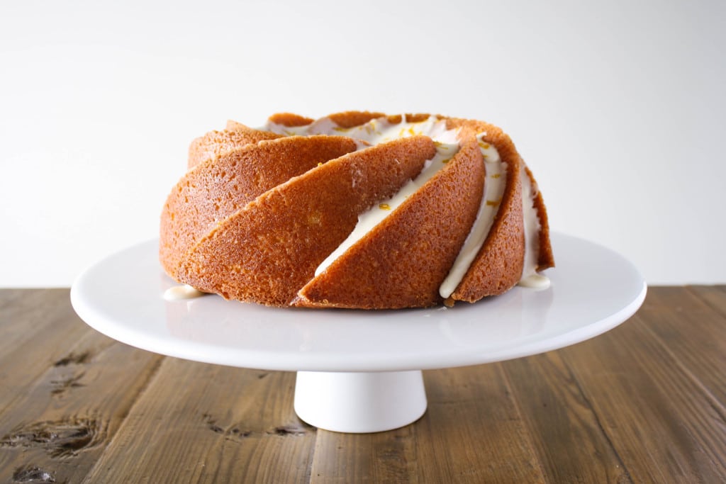 Spiral lemon bundt cake on a cake stand.