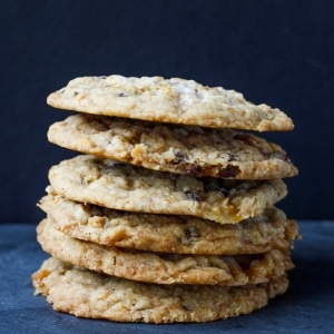 A stack of cookies on a dark background.