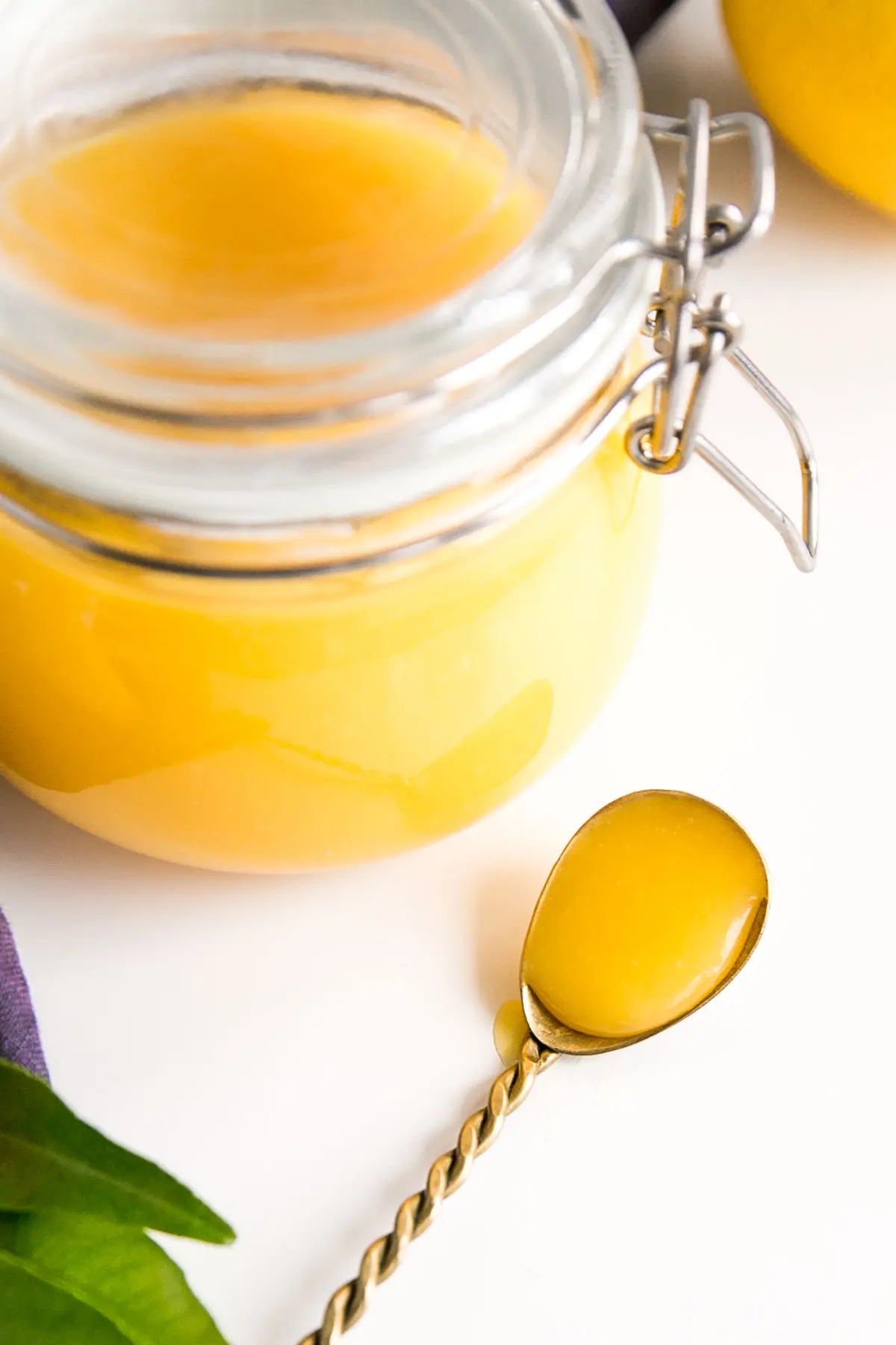 Lemon curd on a spoon.