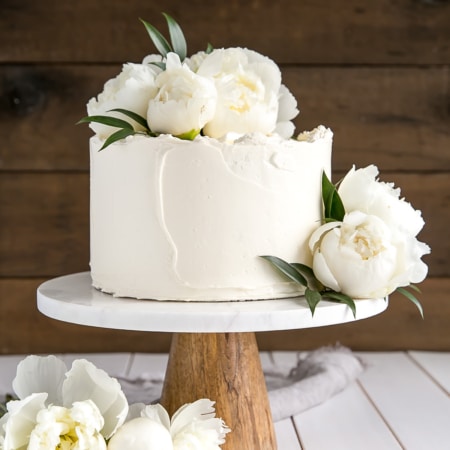 A decorated cake on a cake stand