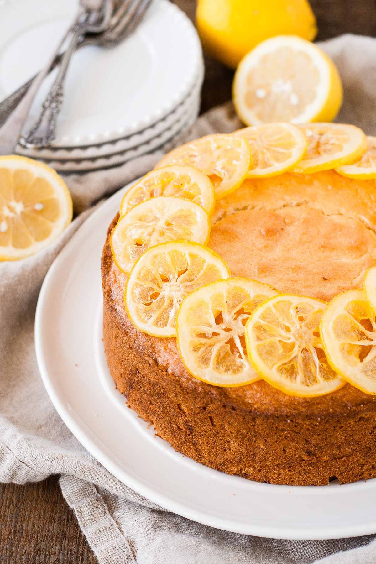 Close up of the cake with candied lemon slices on top.