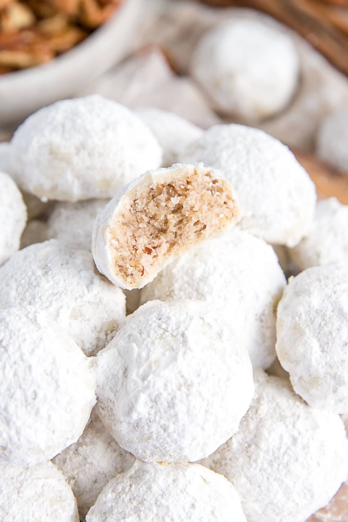 Close up of a cookie with a bite taken out.