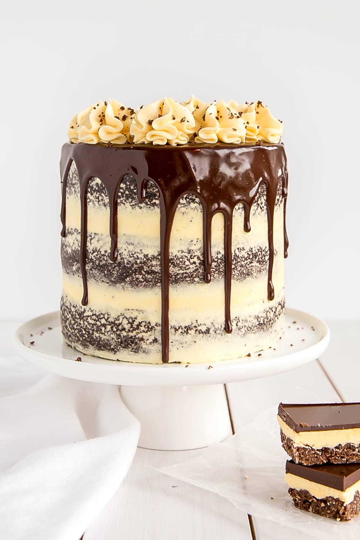 Nanaimo Bar Cake! Chocolate cake, vanilla custard and a chocolate coconut crumble.