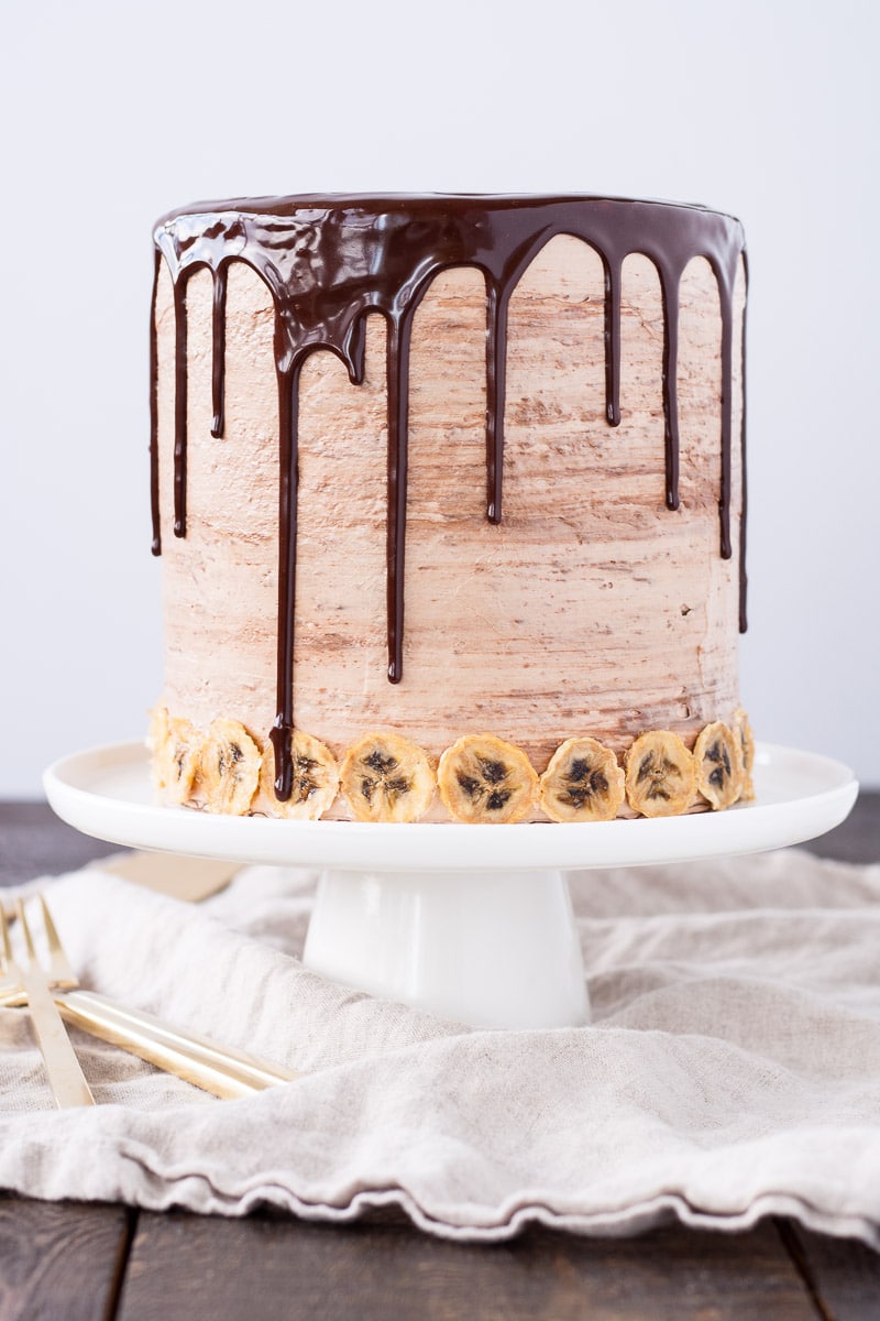 Cake on top of a white cake stand.