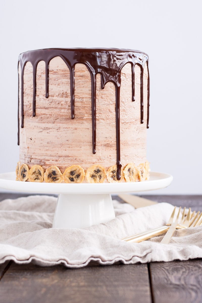 Cake on top of a white cake stand.