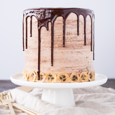 Cake on top of a white cake stand.