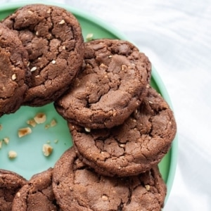 Overhead shot of cookies on a green cake stand.