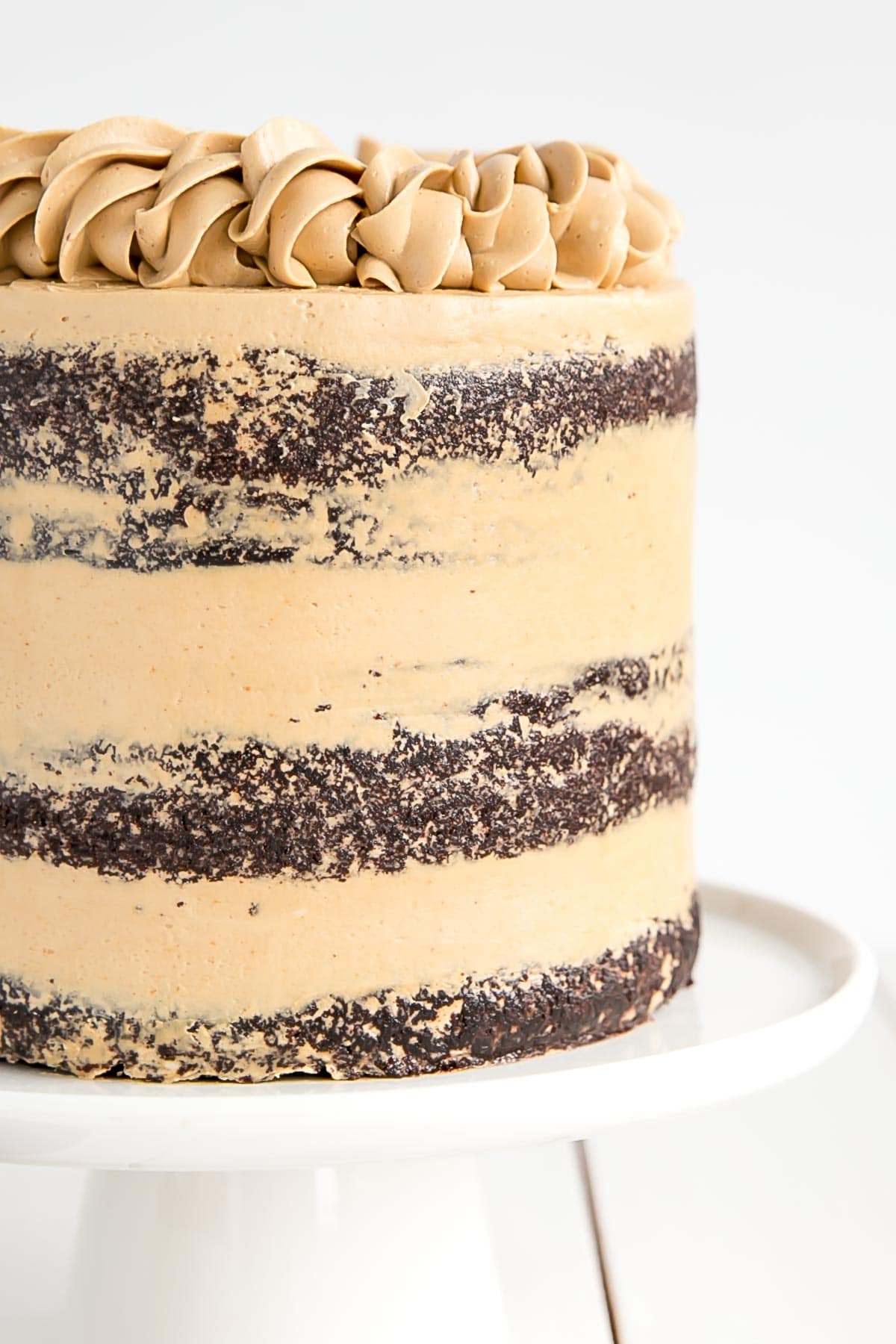 Chocolate layer cake with peanut butter Swiss meringue buttercream.