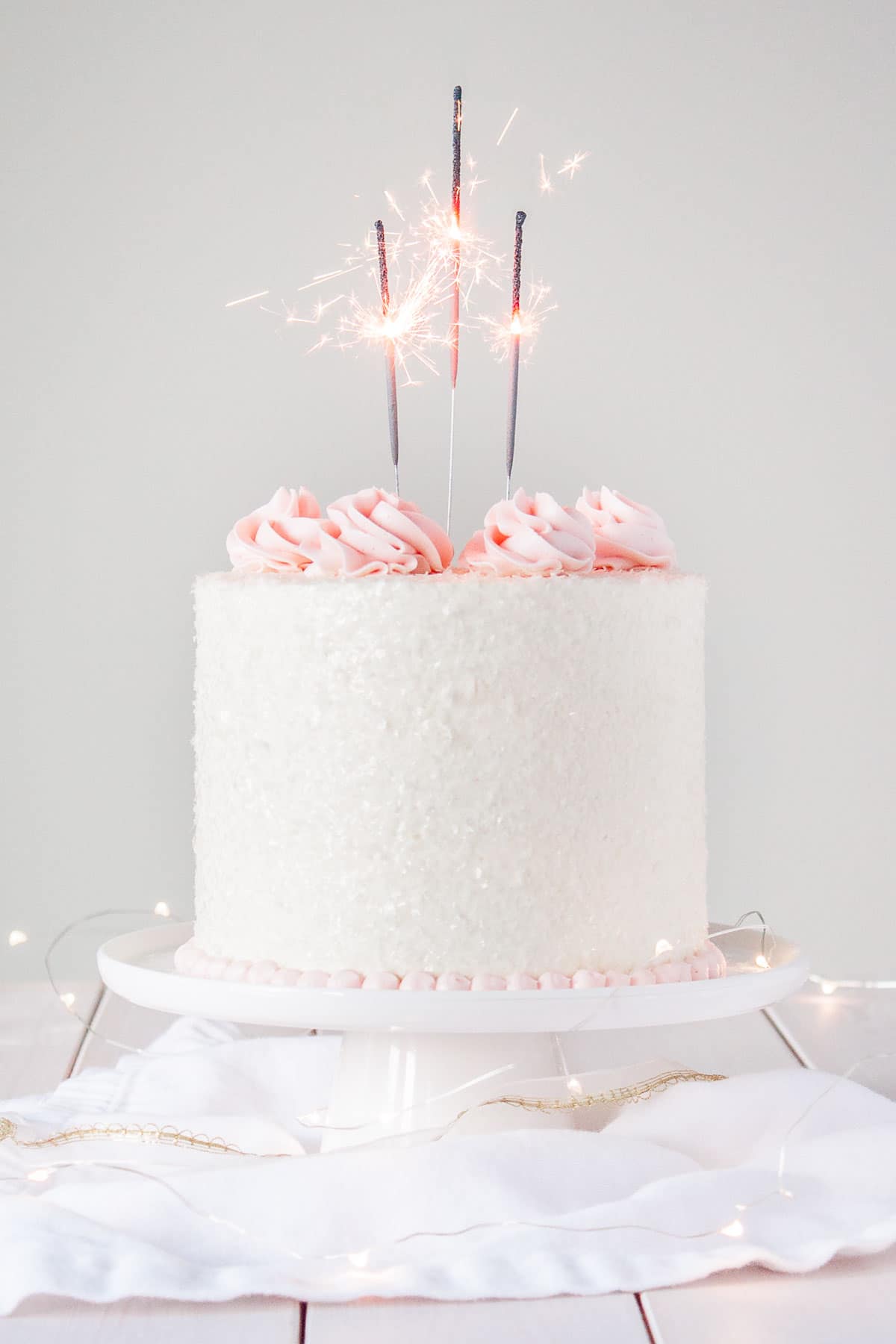 A champagne infused cake with a classic vanilla buttercream.