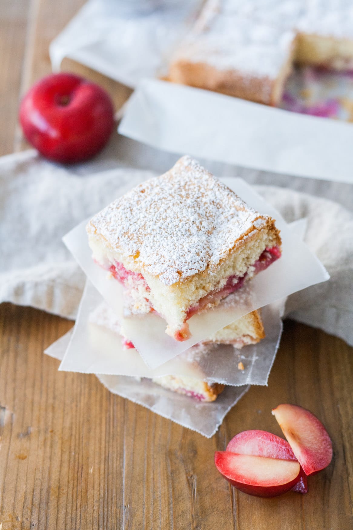 Squares of cake stacked on each other.