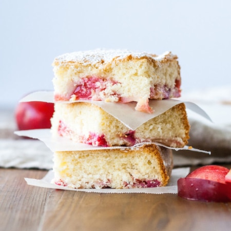 Squares of cake stacked on each other.