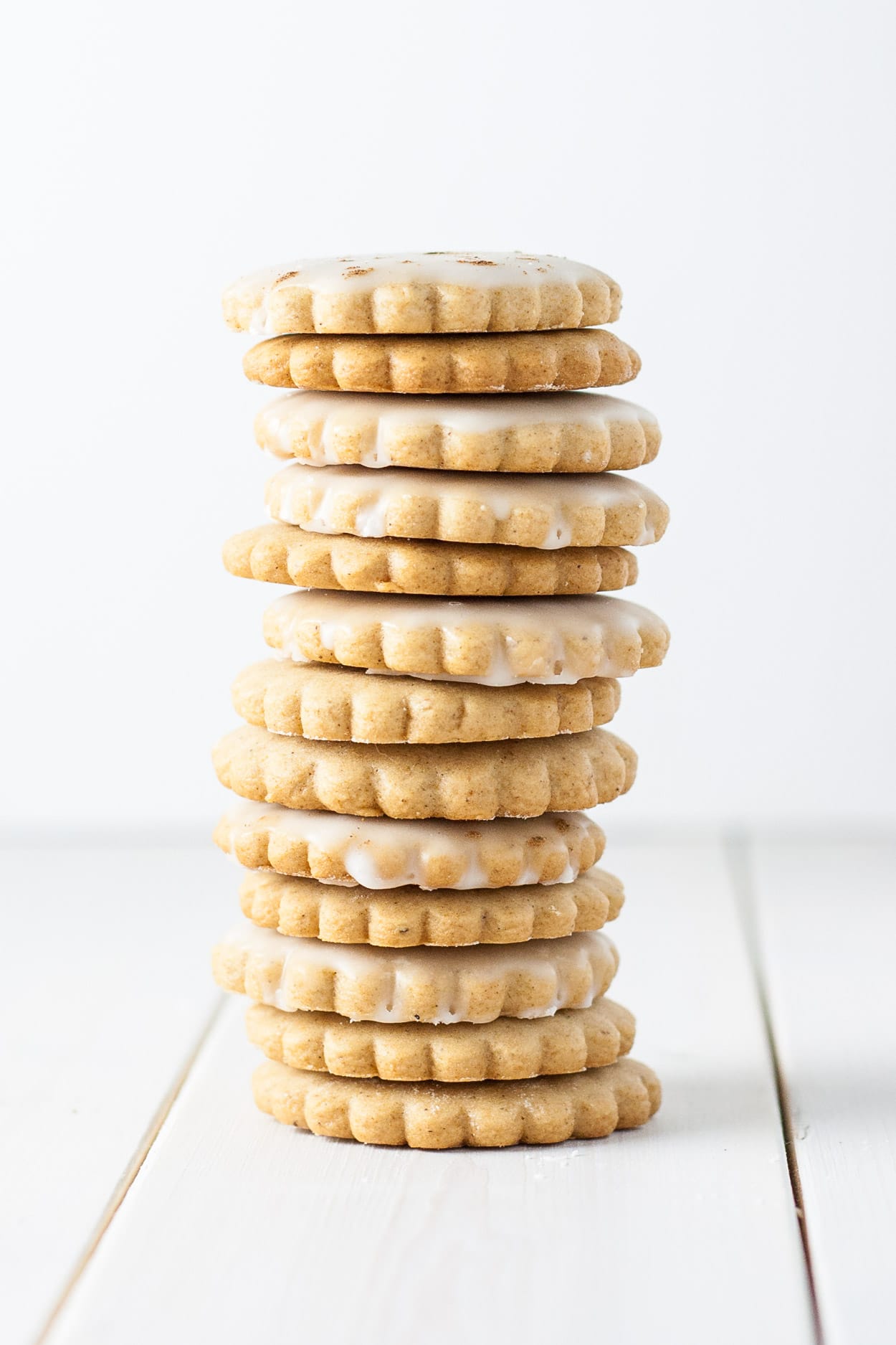 A stack of cookies on a white background.