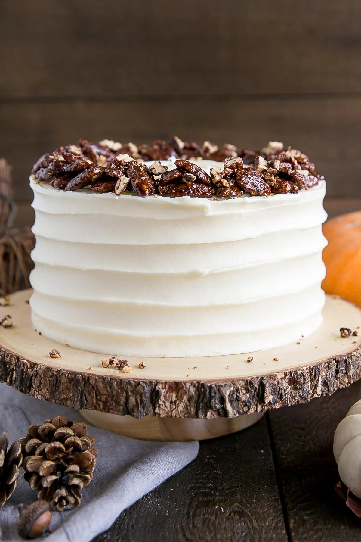 Pumpkin Cake with Cream Cheese Frosting and Candied Pecans.