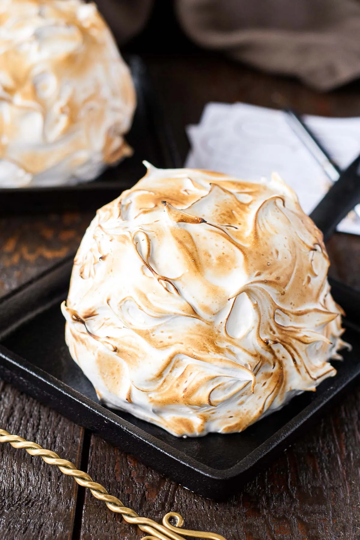 Baked alaska on a small cast iron skillet.