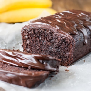 Chocolate banana bread with a couple slices taken out.