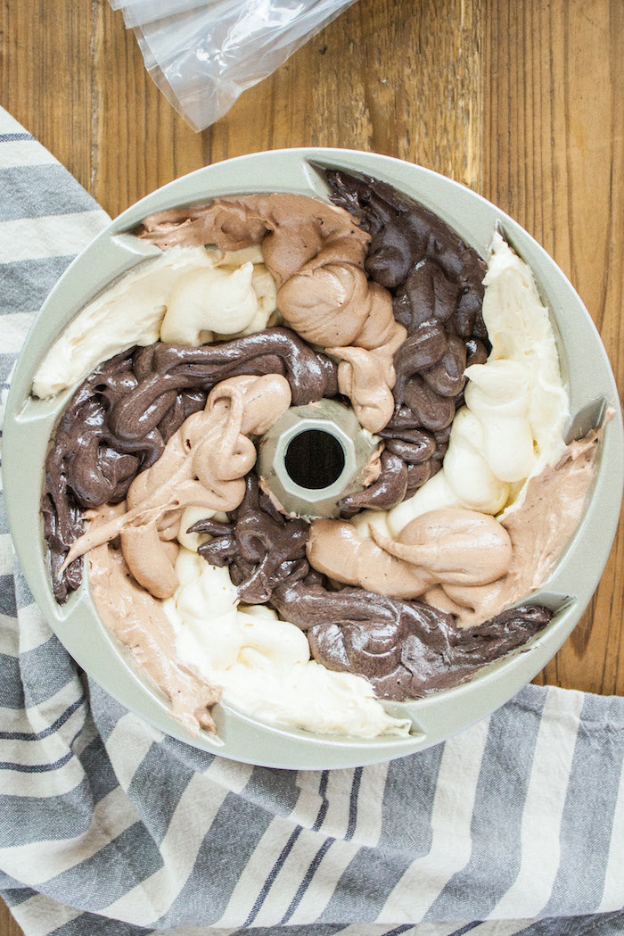 Adding the rest of the cake batter into the pan.